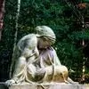 Informationskarte des Evangelischen Friedhofs Haan mit einem Statuenbild.