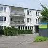 Informationskarte der Seniorenwohnanlage "Haus am Park" Haan mit Gebäudeabbildung.